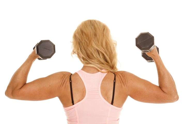 woman lifting weights